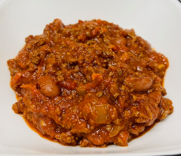 Red chili dish on a white plate