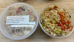 Round plastic container of Hermans Fried Rice, Vegetarian, Rice, eggs, peppers, onions, corn, Sauces, seasonings