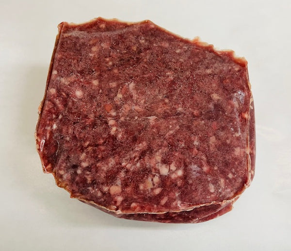 Stack of ground meat on a white background
