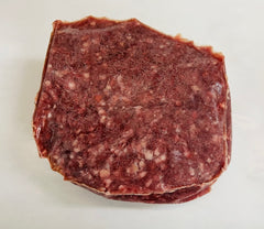 Stack of ground meat on a white background