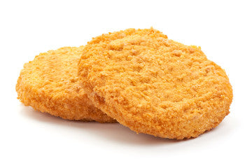 Two golden-brown breaded chicken patties on a white background.