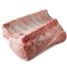 A raw center-cut pork rib roast on a white background.