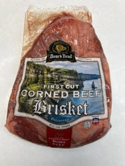 Packaged corned beef brisket with visible brand and labeling, approximately 2-3 lbs.