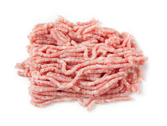 A pile of fresh ground pork lean meat on a white background.