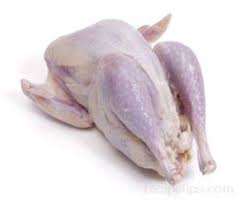 A whole, unprocessed pheasant on a white background.