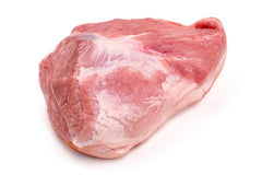 raw pork butt on white butcher paper