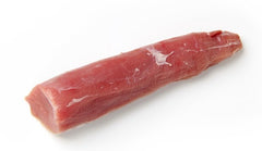 A single pork tenderloin on a white background.