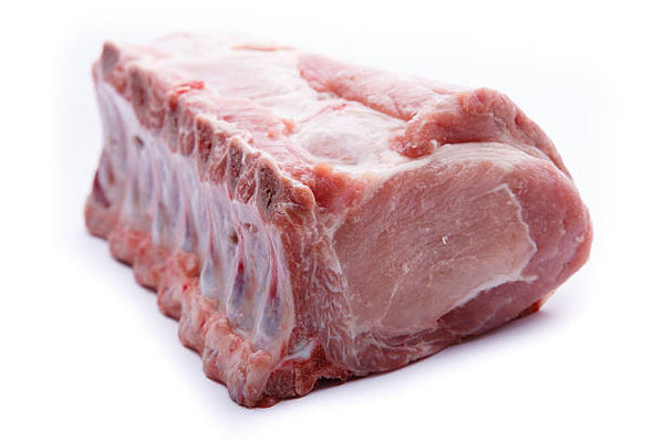 A loin-cut pork roast with a tied knot at the center, resting on a white background.