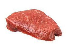raw beef sirloin on white butcher paper