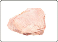 Raw turkey thigh on a white background 