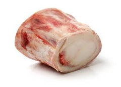 Beef Bone on white butcher paper. 