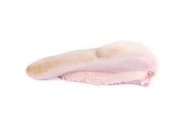A fresh beef tongue on a white butcher paper
