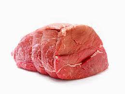 A boneless beef bolar blade roast on a white background.