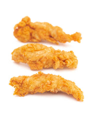 Three pieces of breaded chicken tenders on a white background.