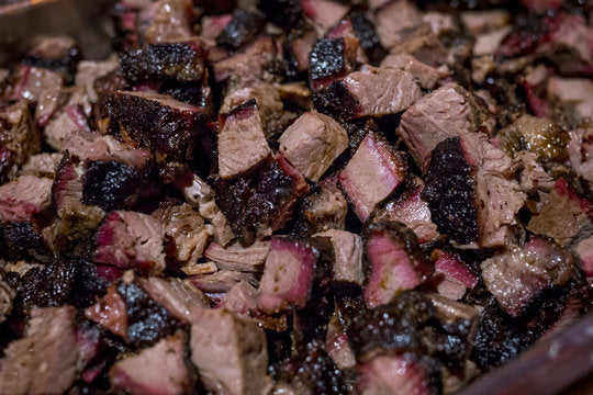 a pile of smoked burnt beef ends. ready to eat