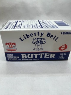 Liberty bell butter on a white surface. 