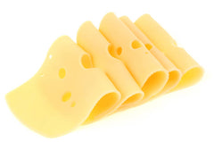 A batch of yellow Swiss cheese with holes, also known as holes-patterned cheese, arranged in a row on a white background.