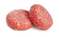 Two raw ground chuck patties on a white background