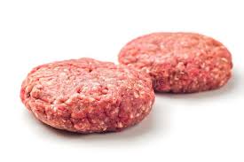 Two raw ground round patties on a white background
