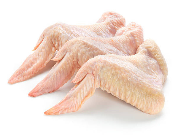 Three chicken wings laying together with a white background. 