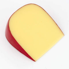A wedge of smoked Gouda cheese on a white background.