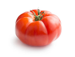 A single fresh tomato with a green stem on a white background.